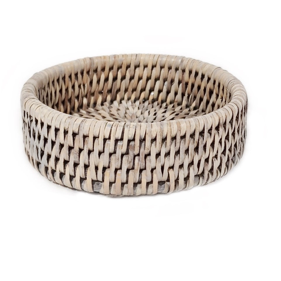 Grey and natural rattan wine bottle coaster by Sable Homeware, designed to protect surfaces from drips and add rustic charm.