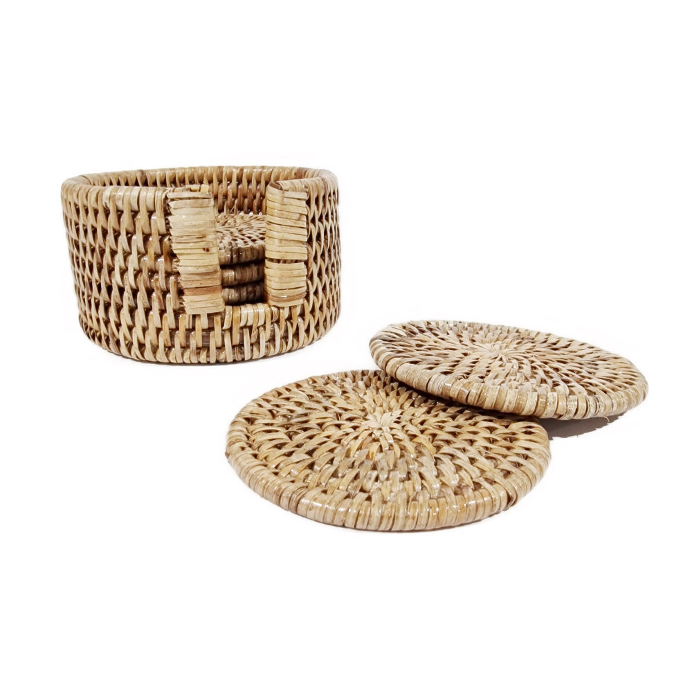 Six round grey and natural rattan coasters with matching holder from Sable Homeware, designed to protect surfaces.