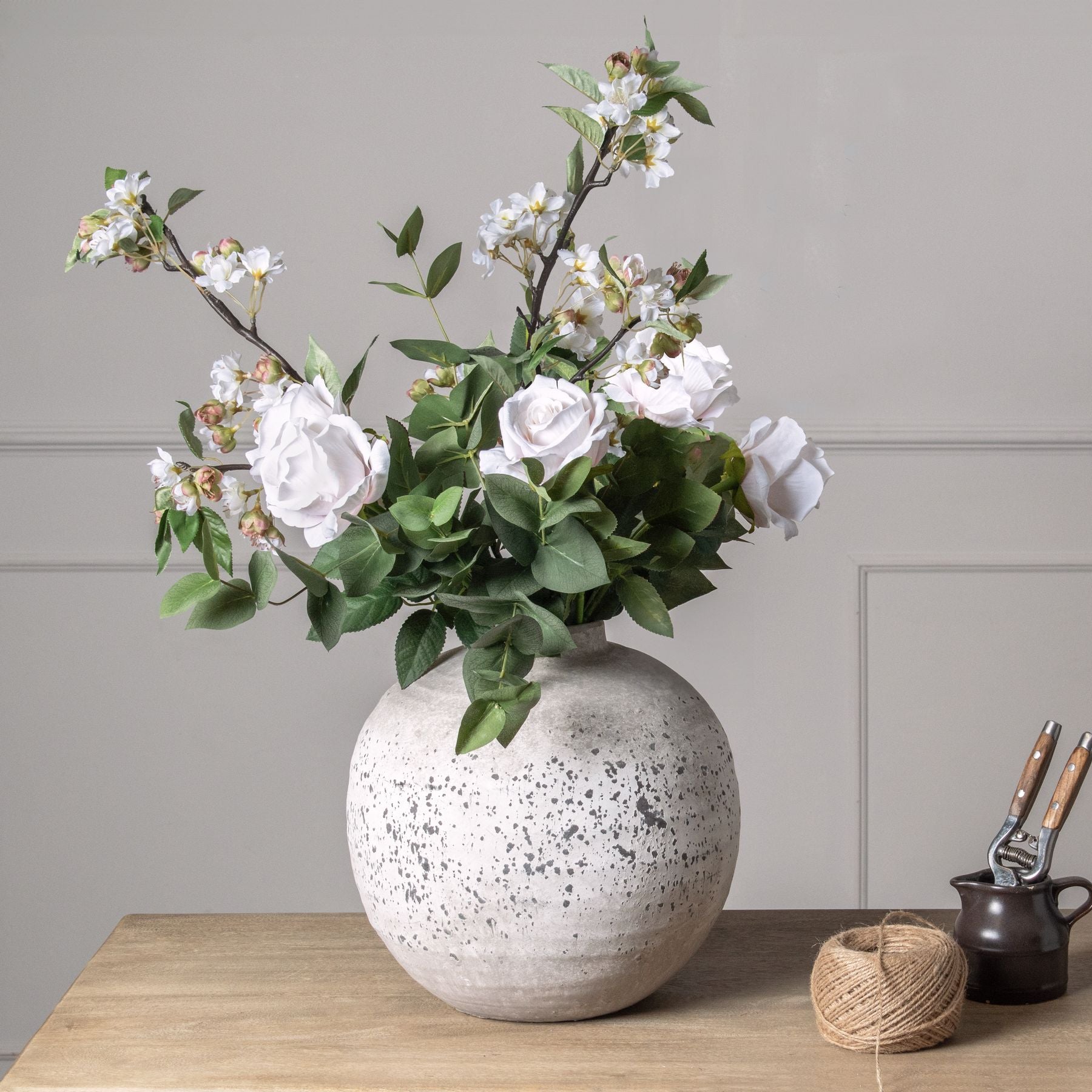 Sable Homeware English Blossom faux flower branch with delicate pink blossoms and green leaves, ideal for home decor.
