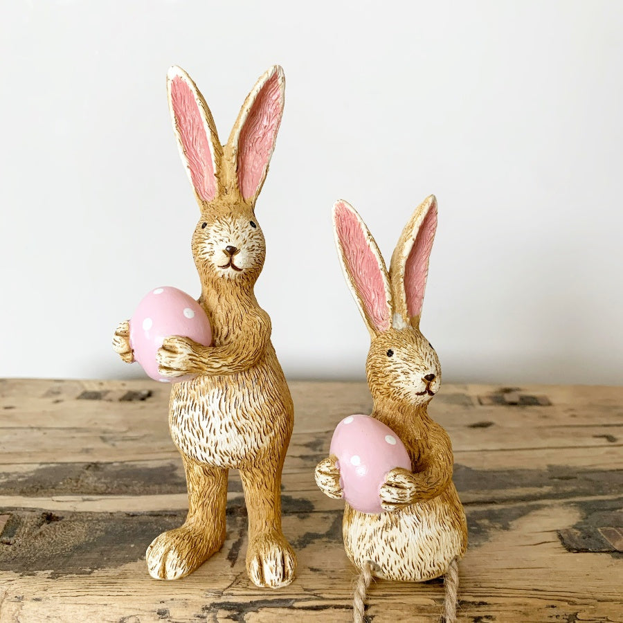 Shabbyquins Easter Bunny ornament with decorative eggs, featuring a festive and charming design for Easter celebrations.