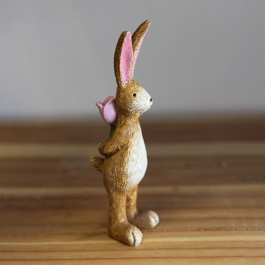 Shabbyquins bunny with rose ornament featuring a cute bunny figure holding a rose, ideal for decorative display.