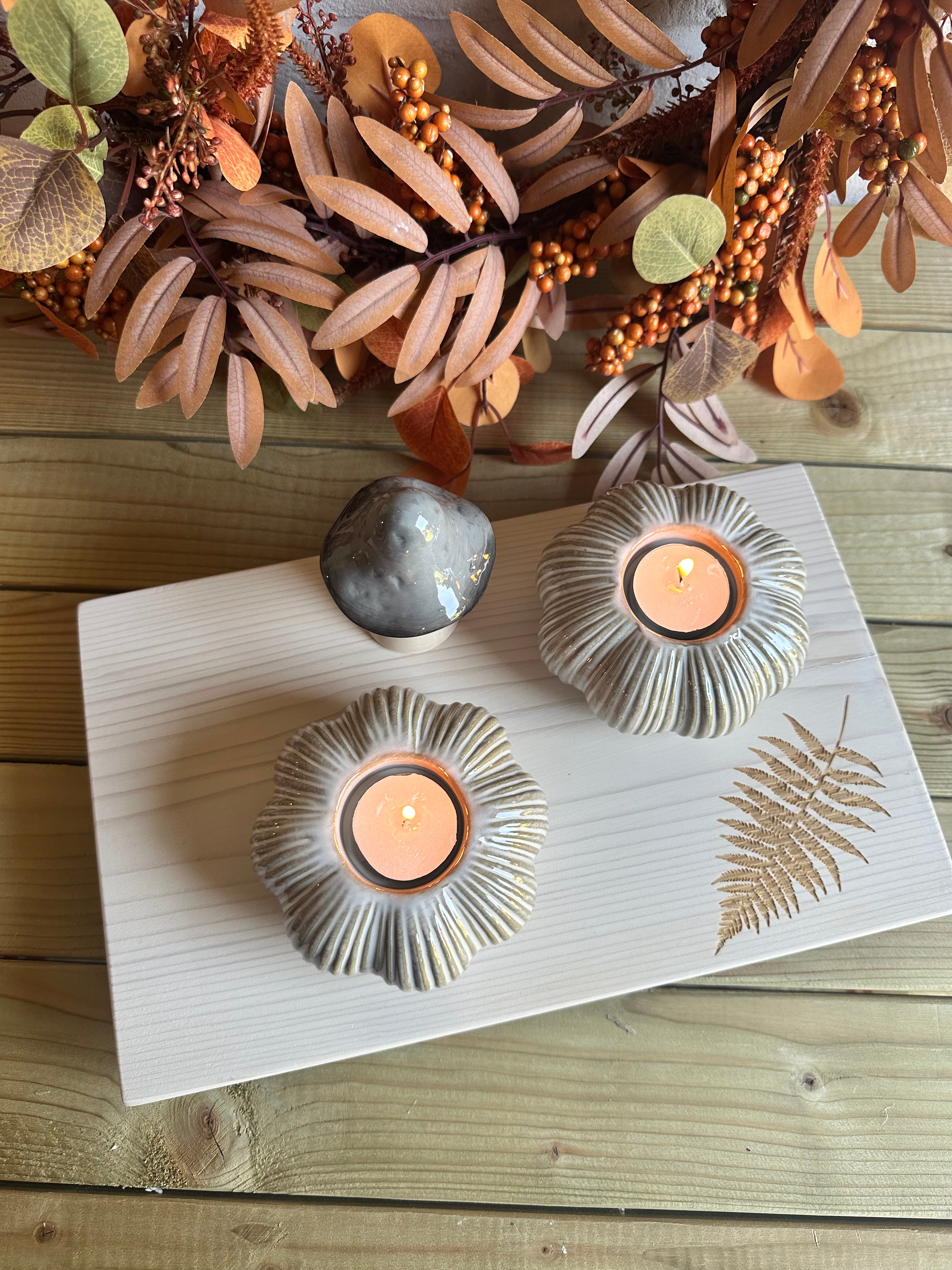 White pumpkin candle holder by Sable Homeware, featuring two styles, designed to hold candles and add a decorative touch.
