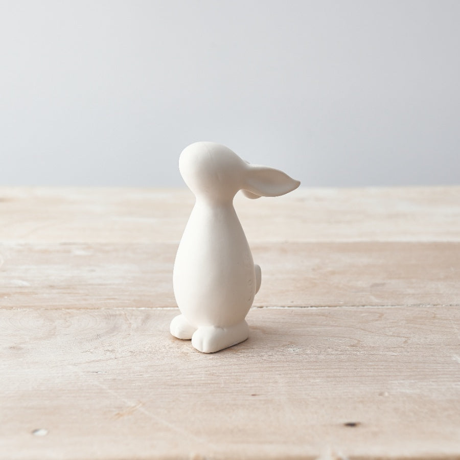 Set of 2 matte white Easter bunny ornaments with a soft finish, ideal for spring decor and holiday celebrations.
