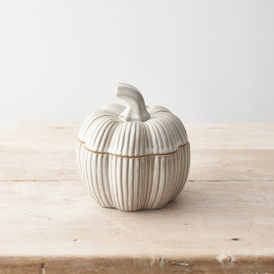 Set of two natural glazed ceramic Halloween pumpkin pots by Sable Homeware, featuring textured orange and beige finishes.