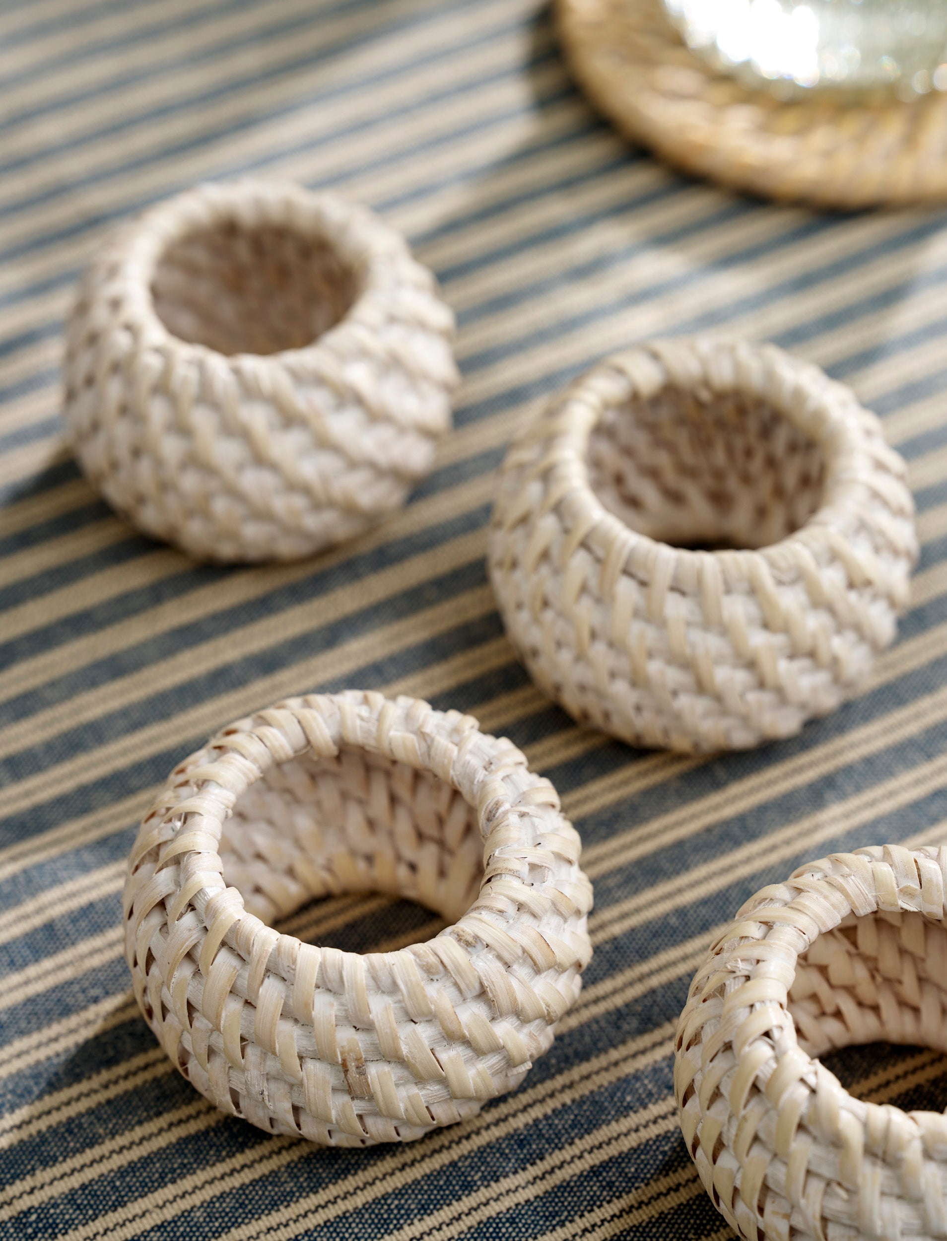 Sable Homeware Wittering Table Styling Set with rattan placemats and linen napkins, perfect for elegant dining table decoration