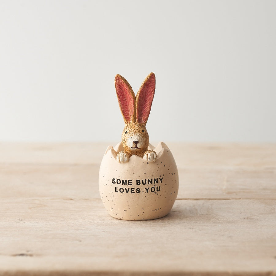 Two 'Some Bunny Loves You' rabbit ornaments by Shabbyquins in different styles, showcasing adorable bunny designs.