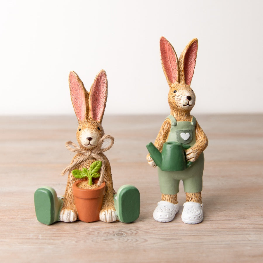 Set of 2 gardening themed bunny ornaments by Shabbyquins, featuring detailed bunny designs perfect for outdoor decor.