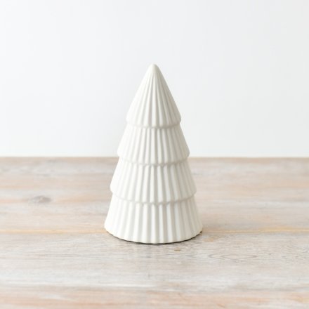 Set of 3 white glazed Christmas trees by Shabbyquins, decorative ceramic holiday tree figures in varying sizes.