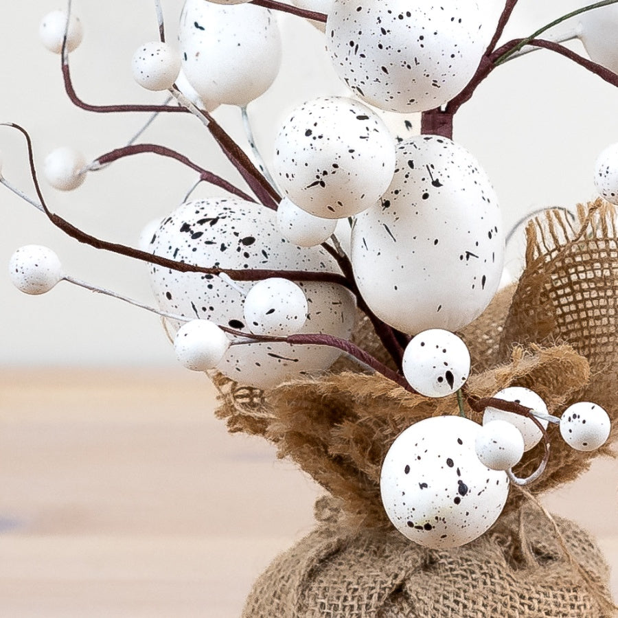 White artificial Easter egg tree by Shabbyquins featuring a decorative tree with white eggs for festive spring decor.
