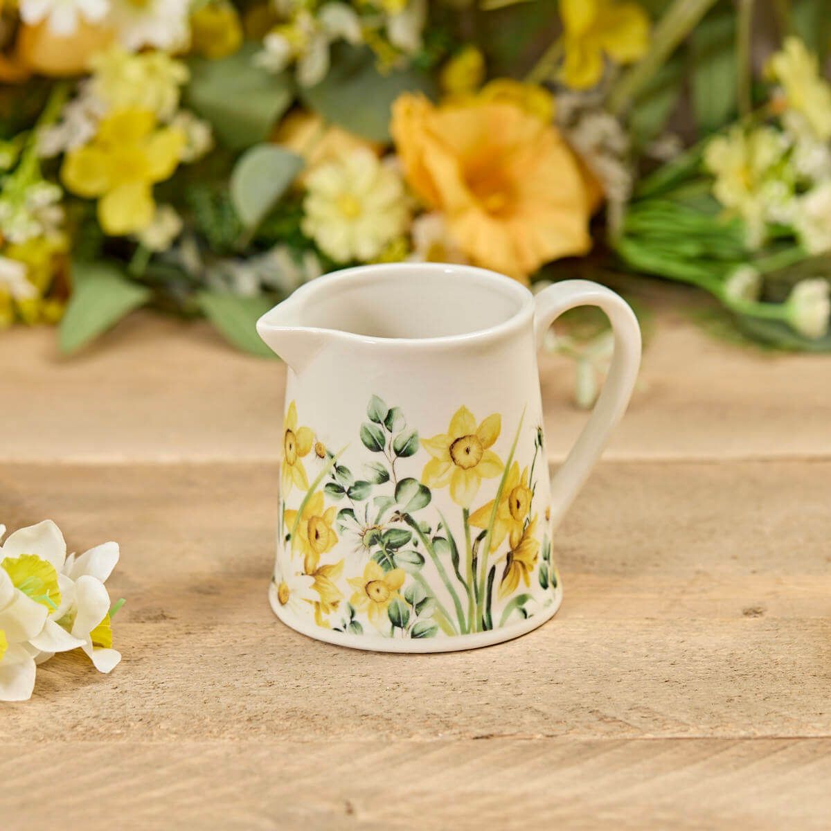 Shabbyquins stoneware jug and mug set featuring daffodil and daisy floral designs, perfect as a decorative vase and drinkware.