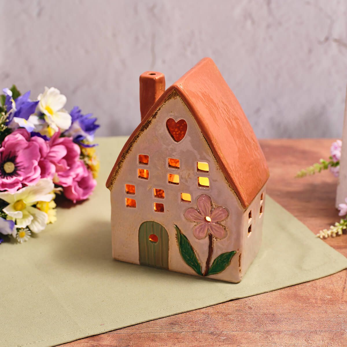 Shabbyquins Stoneware House Candle Holders set with rustic, textured ceramic design and multiple house-shaped candle holders.