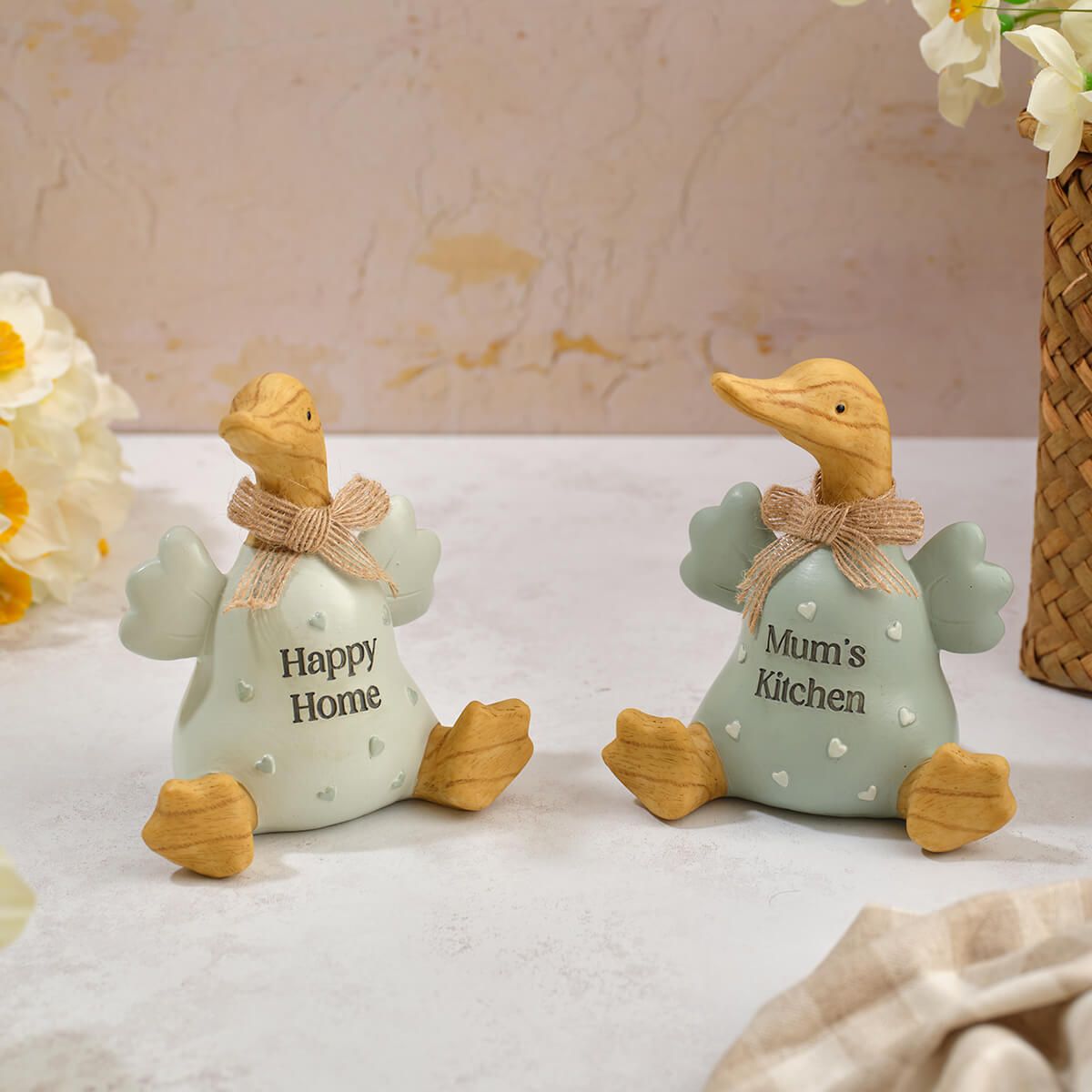 Decorative embossed Happy Home and Mum's Kitchen ducks figurines by Sable Homeware, featuring detailed craftsmanship and charming design.