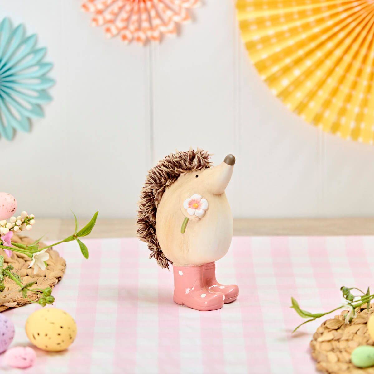 Cute hedgehog ornaments in colorful Wellies by Shabbyquins, featuring detailed ceramic figures perfect for garden or home decor.