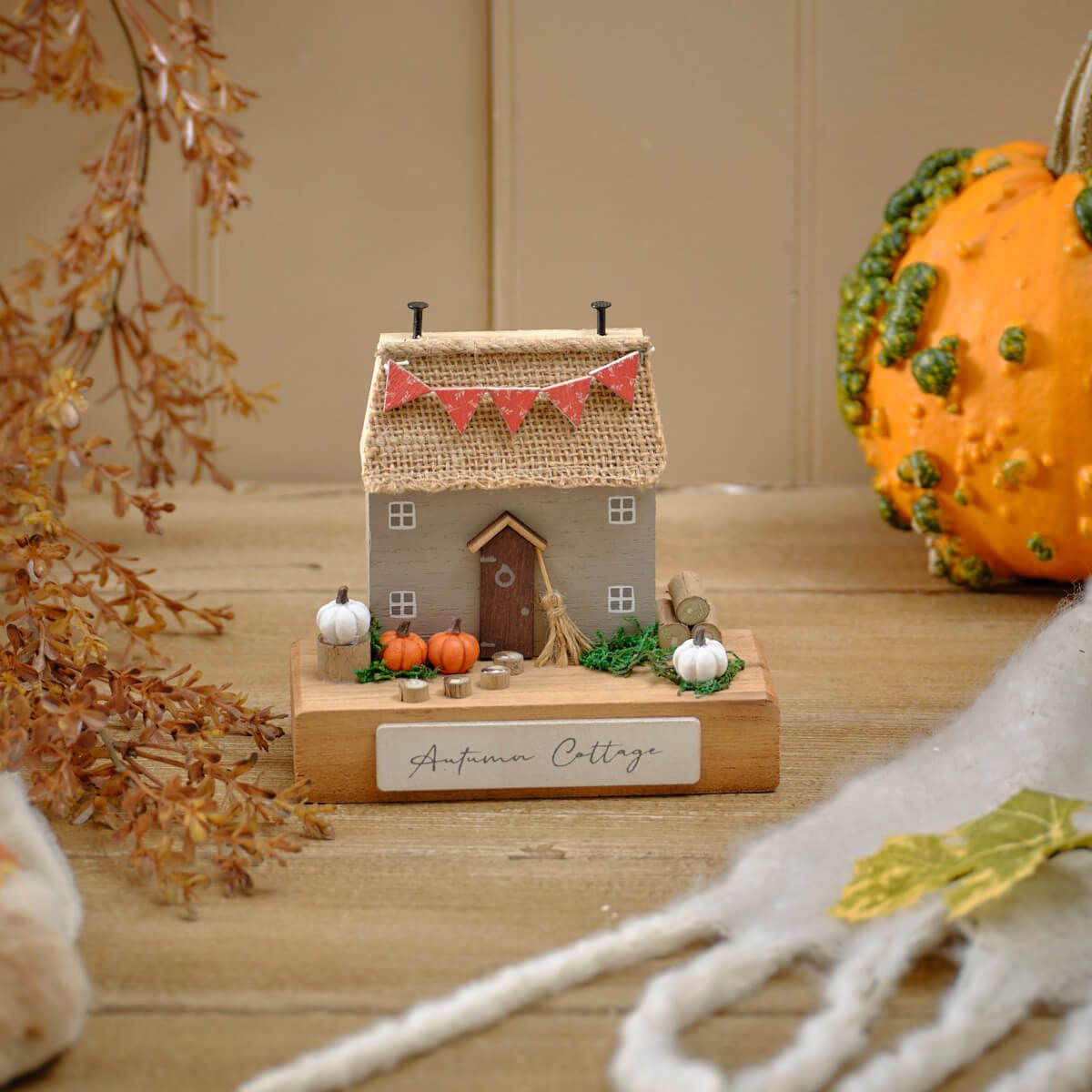 Shabbyquins Harvest Home Autumn Cottage wooden ornament with fall-themed design on rustic wooden block.