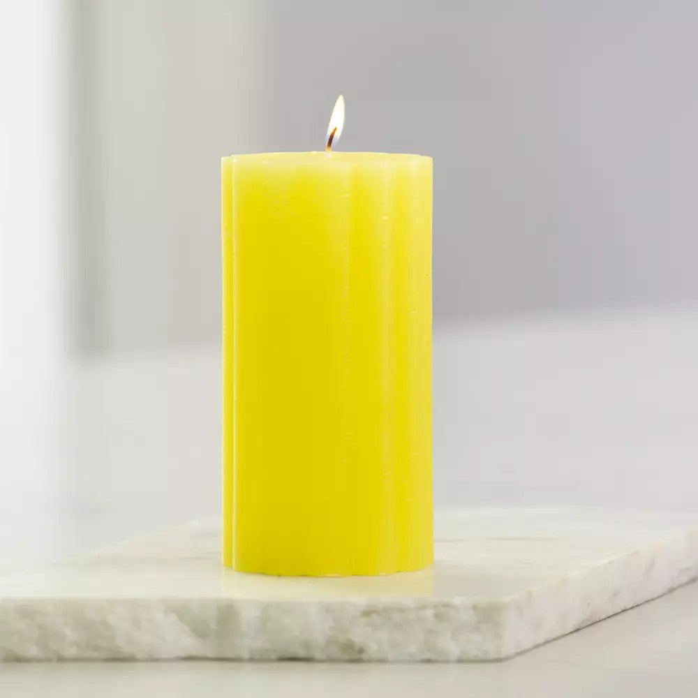 Rustic scalloped lemon pillar candle by Sable Homeware, featuring a textured yellow design perfect for rustic decor.