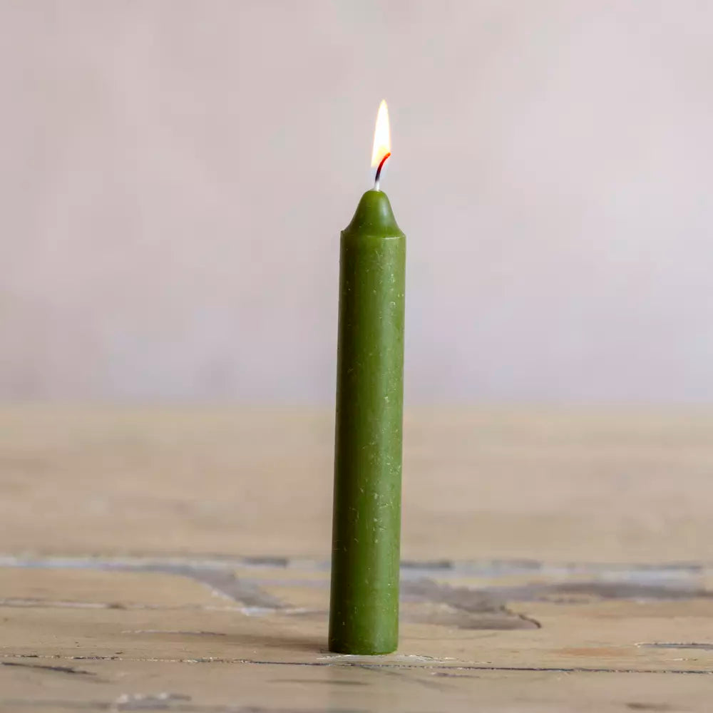 Bundle of five short Sable Homeware dinner candles, ivory-colored with smooth wax finish, ideal for elegant table settings.