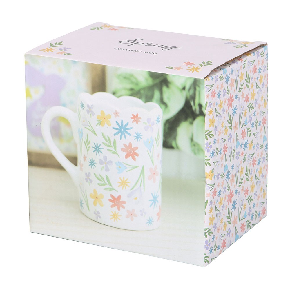 Sable Homeware floral print scalloped mug with colorful flower design and curved scalloped edges on white ceramic.