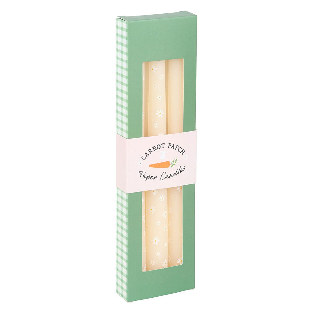 Set of three Carrot Patch Daisy print taper candles by Sable Homeware, featuring vibrant daisy patterns on tall wax candles.