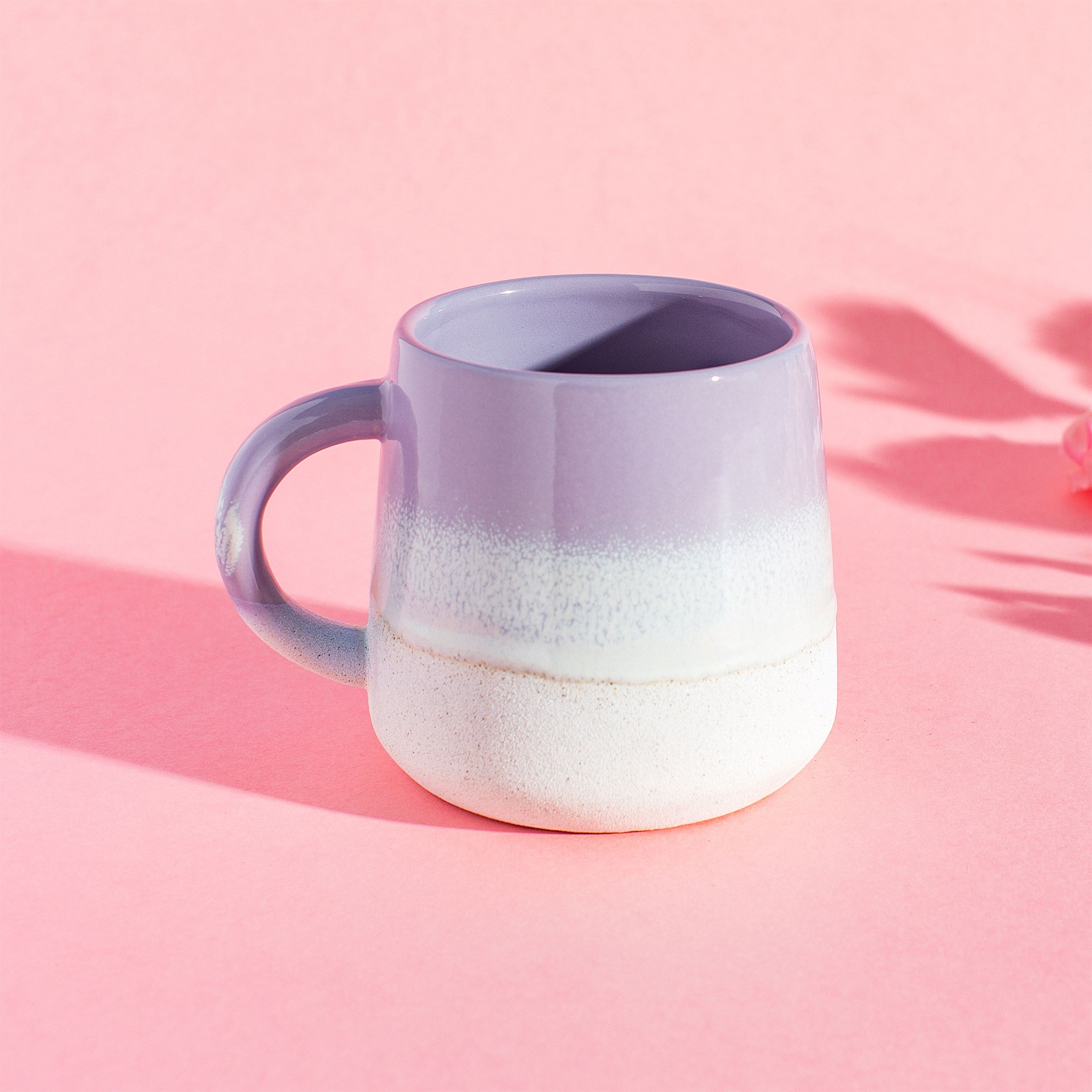 Sable Homeware Mojave Glaze Mug in multiple colors, ceramic mug with a smooth glazed finish, shown in a lifestyle setting.