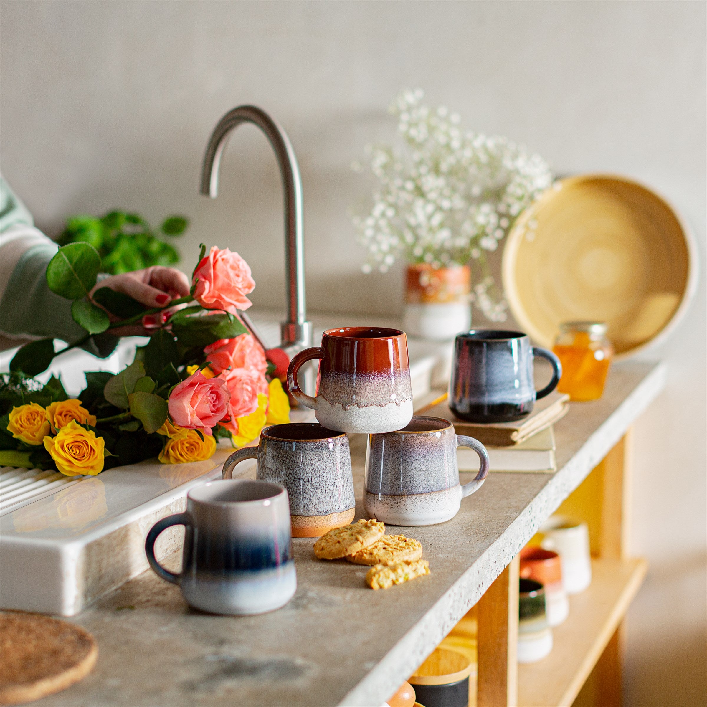 Sable Homeware Mojave Glaze Mug in various colors, close-up of ceramic mug with colorful glazed finish and handle.