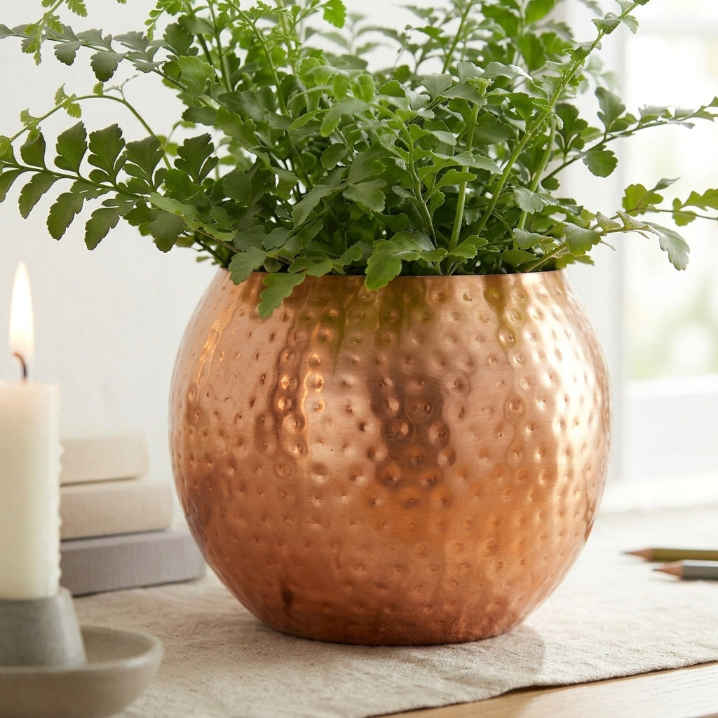Hammered copper round planter by Sable Homeware with a textured finish, perfect for indoor or outdoor plant displays.
