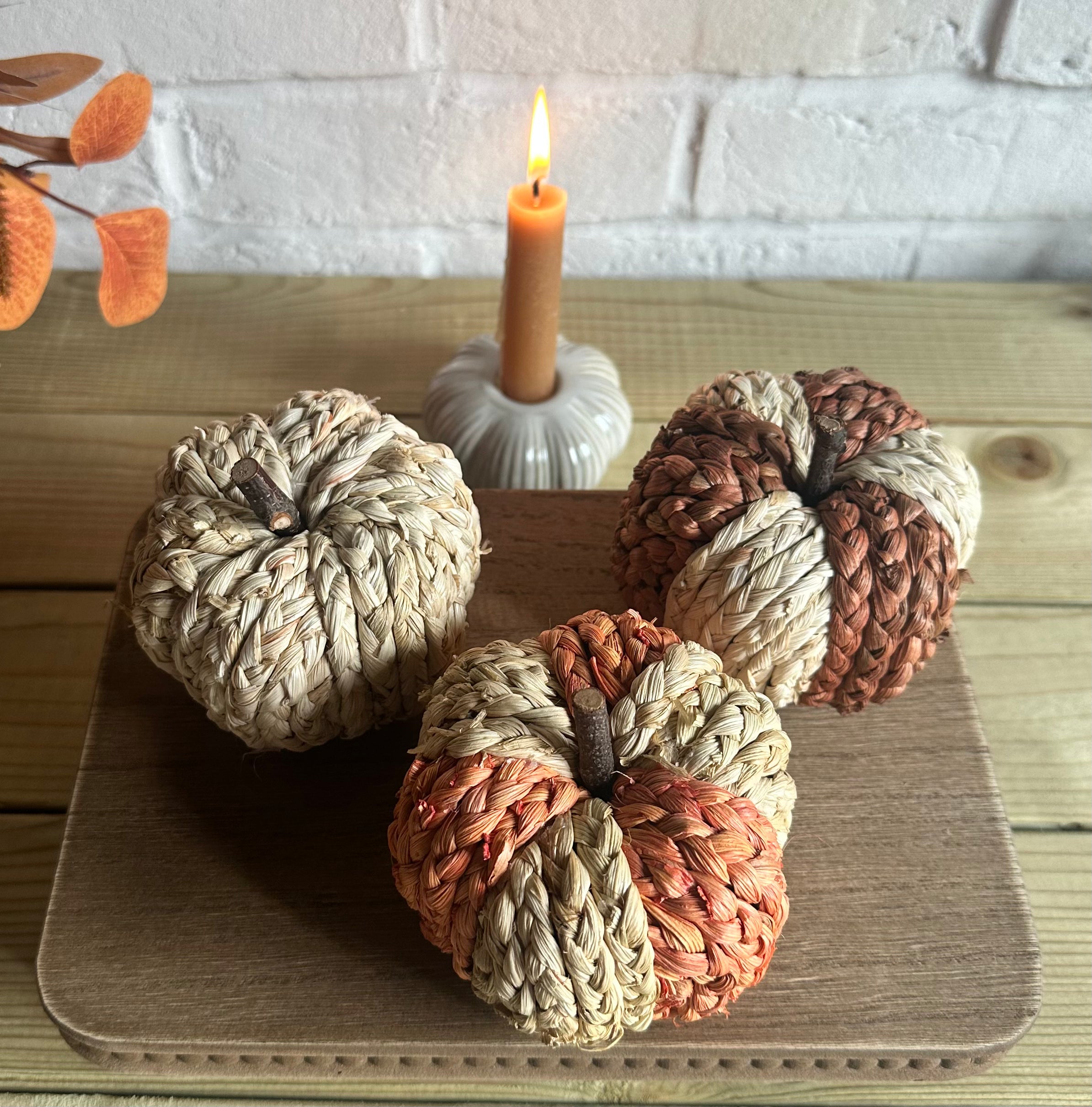 Set of 3 small raffia pumpkins in two colors, Halloween decor by Sable Homeware, with textured raffia surface and festive appearance.