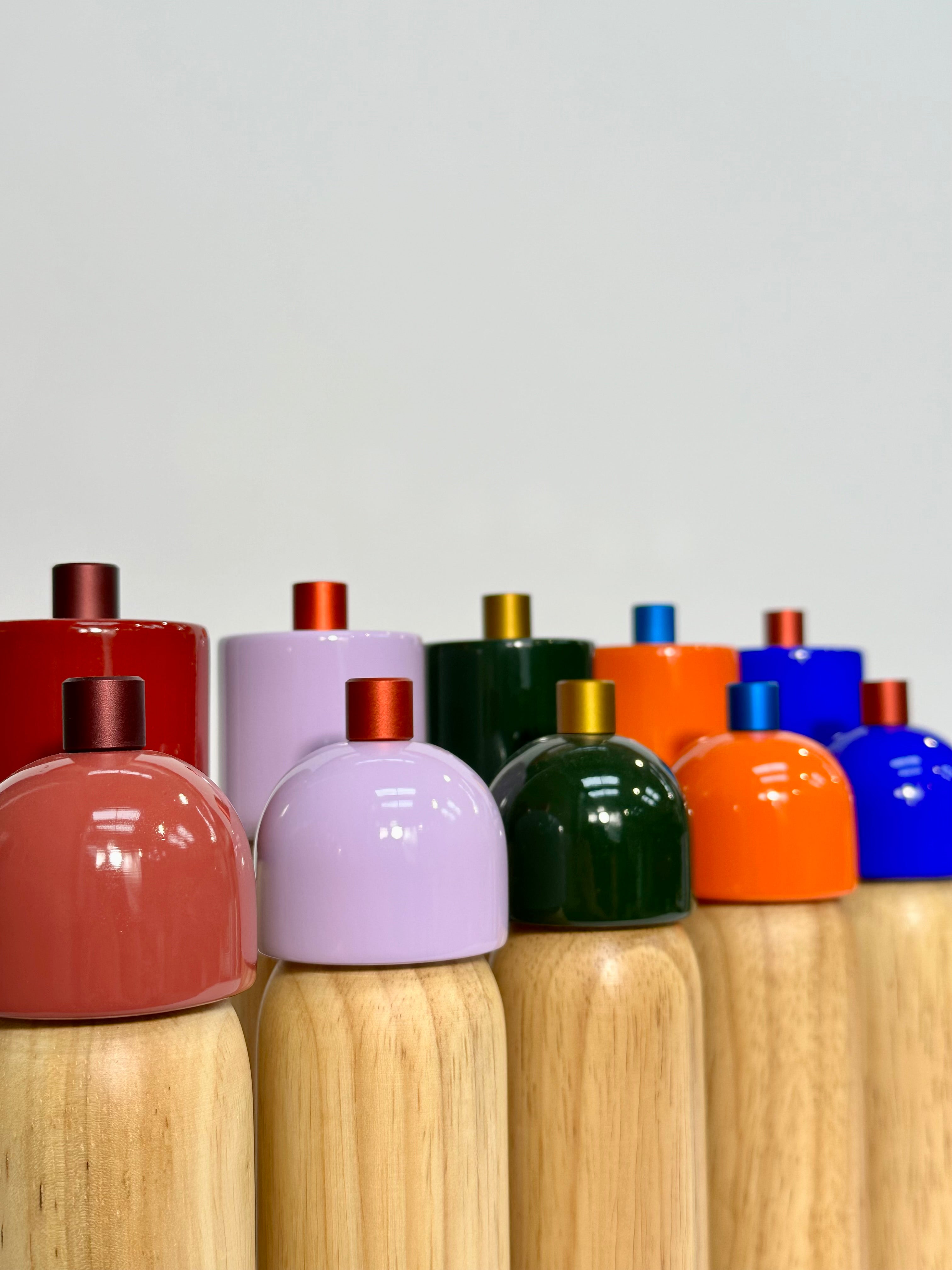 Sable Homeware Deluxe salt and pepper grinders on a dining table, showcasing modern kitchen accessories for seasoning.