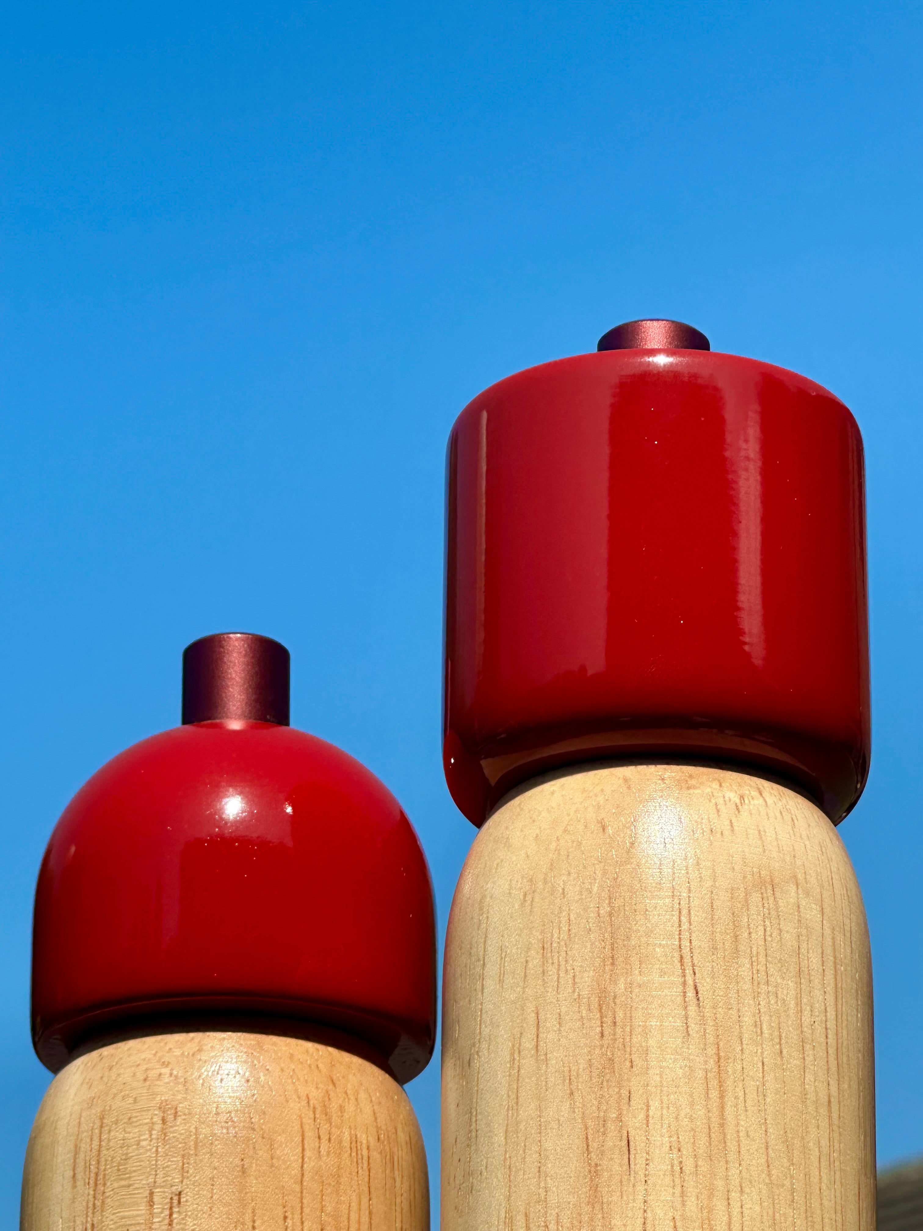 Red Sable Homeware Deluxe Salt and Pepper Grinder set on a kitchen table, showcasing stylish table accessories with a modern design.