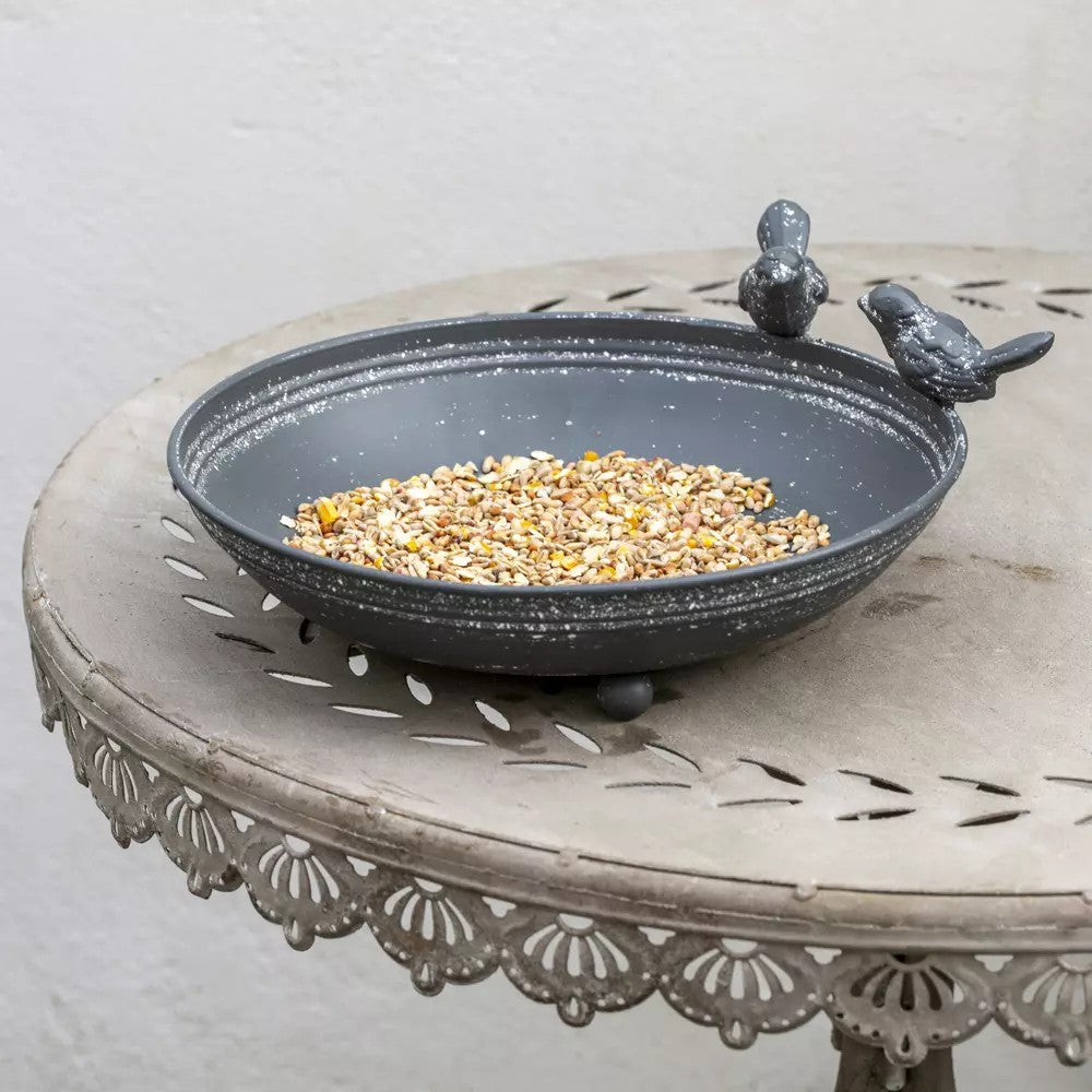 Grey metal bird bath and feeder with decorative feet by Sable Homeware, suitable for outdoor garden bird watching.