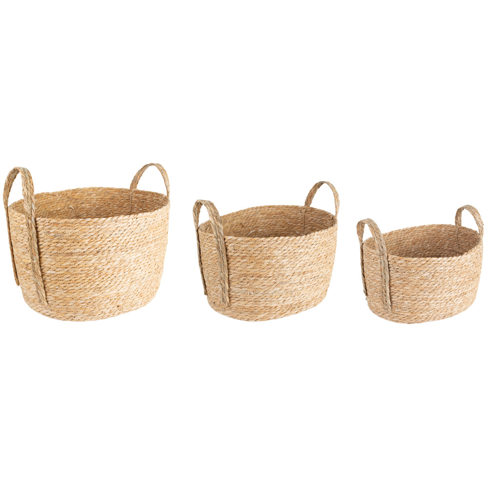Set of three oval Seagrass baskets with handles by Shabbyquins, showcasing natural woven textures and sturdy handles for storage.