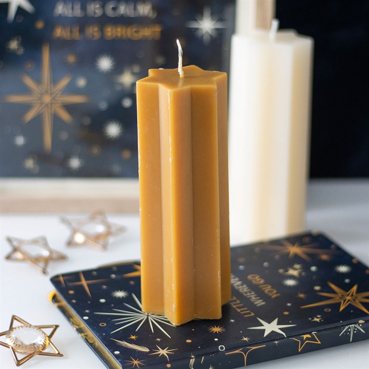 Star-shaped taper candle from Sable Homeware in three colors, featuring a tall, elegant design for decorative candle displays.