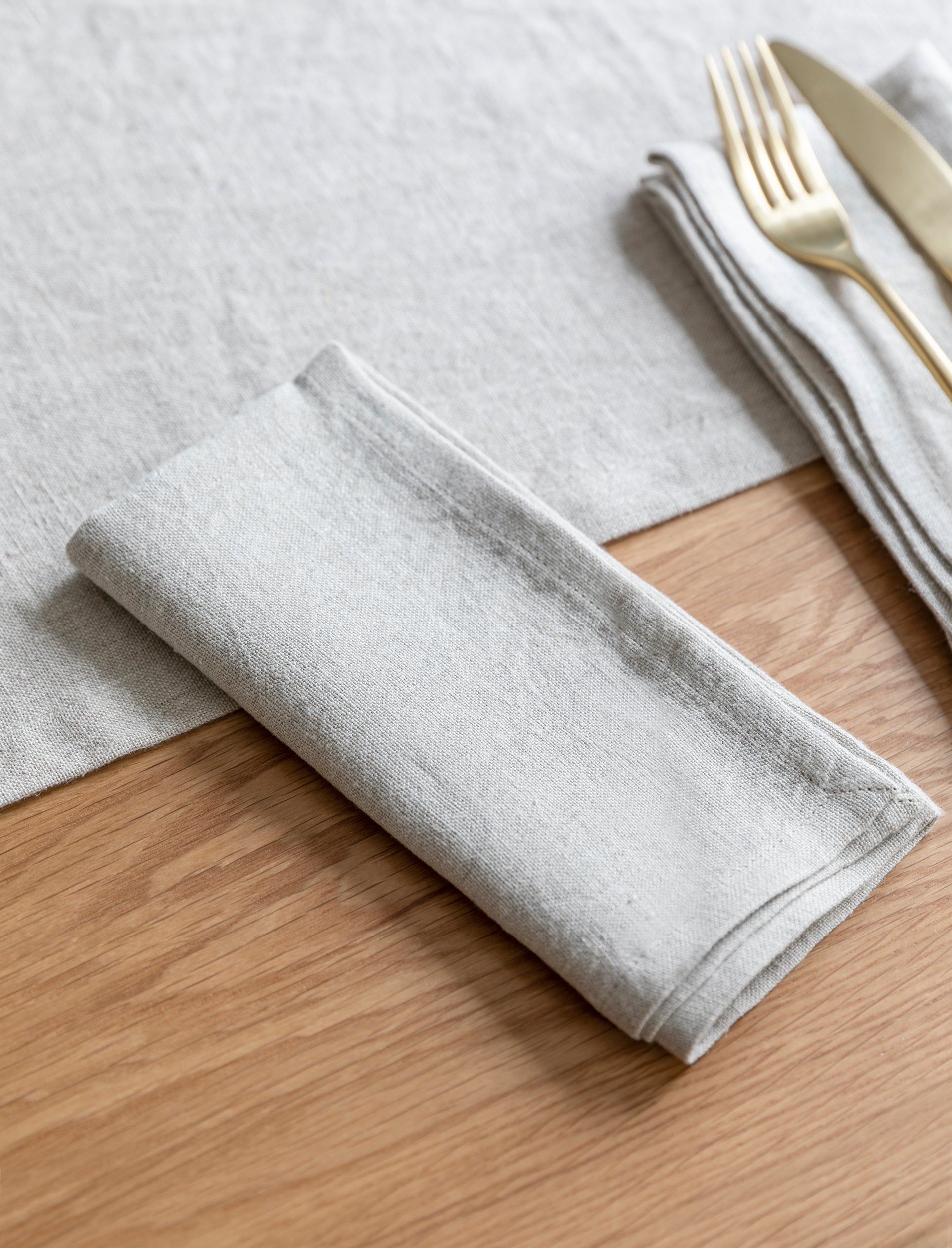 Set of 4 natural linen napkins from Sable Homeware, elegant table accessories for dining and entertaining.