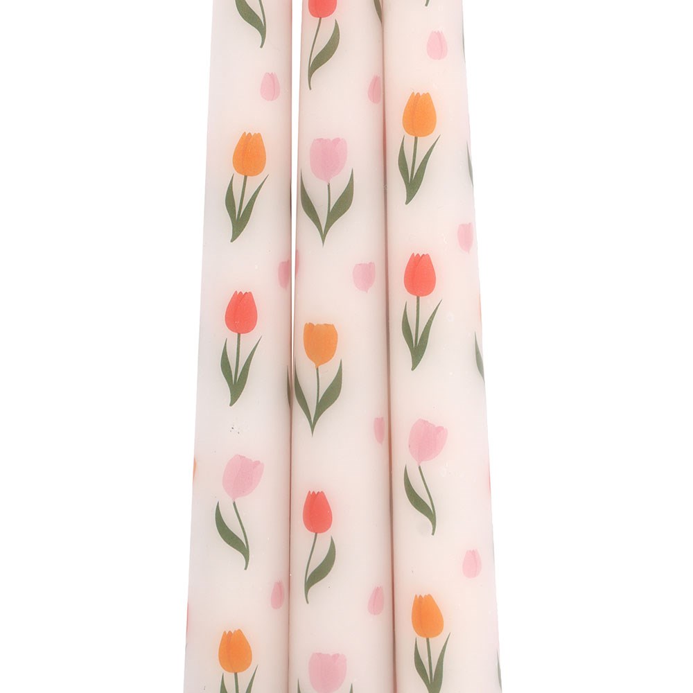 Set of three tulip print taper candles by Sable Homeware, featuring colorful tulip designs on tall, elegant candle holders.