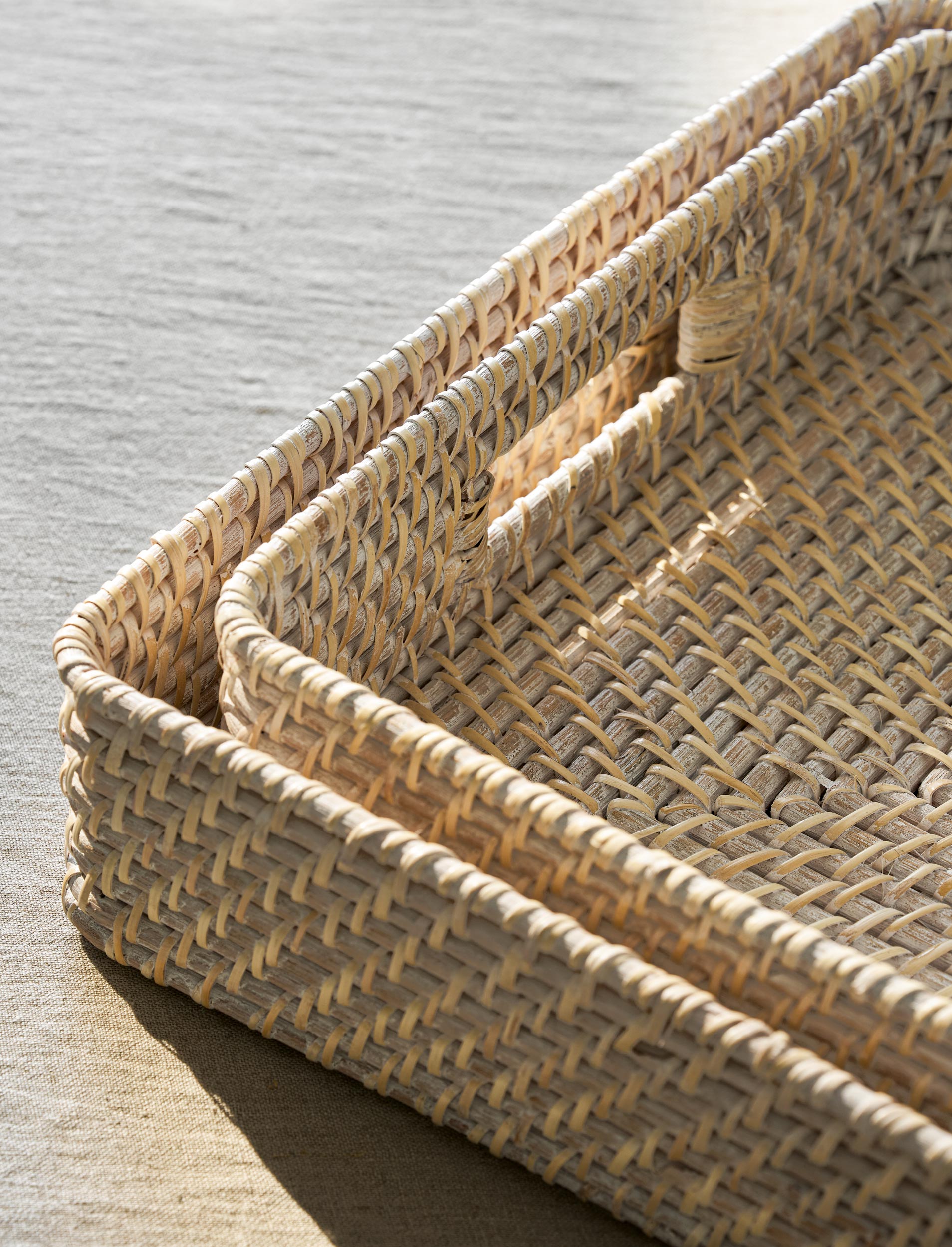 Set of two Wittering Rattan rectangular baskets by Sable Homeware, showcasing woven rattan baskets for storage or decor.