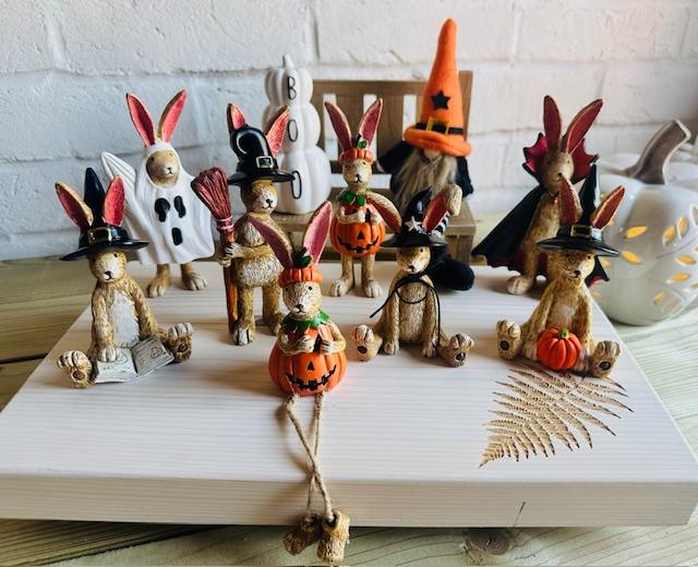 Three Halloween sitting witch rabbit ornaments by Sable Homeware featuring festive designs and witch costumes.