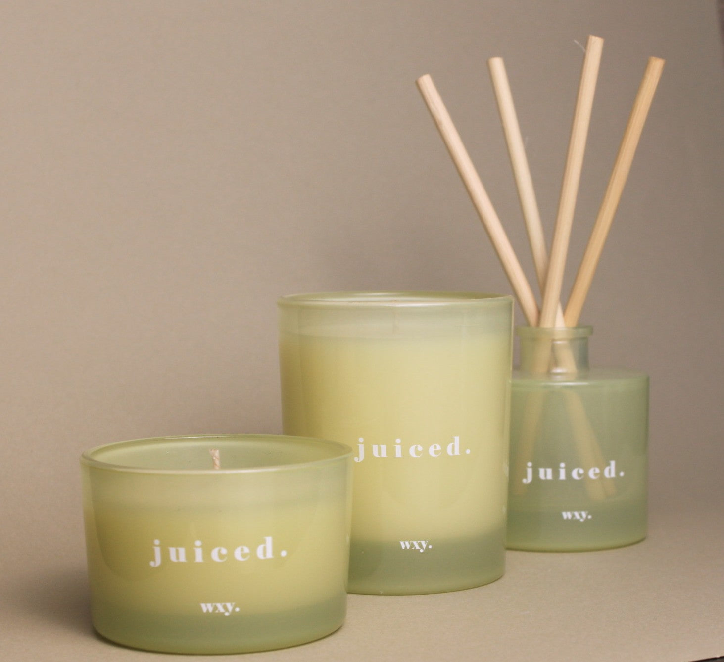 Sable Homeware Juiced Lime, Avocado, and Cucumber Water scented candle with a white wax finish and minimalist design.