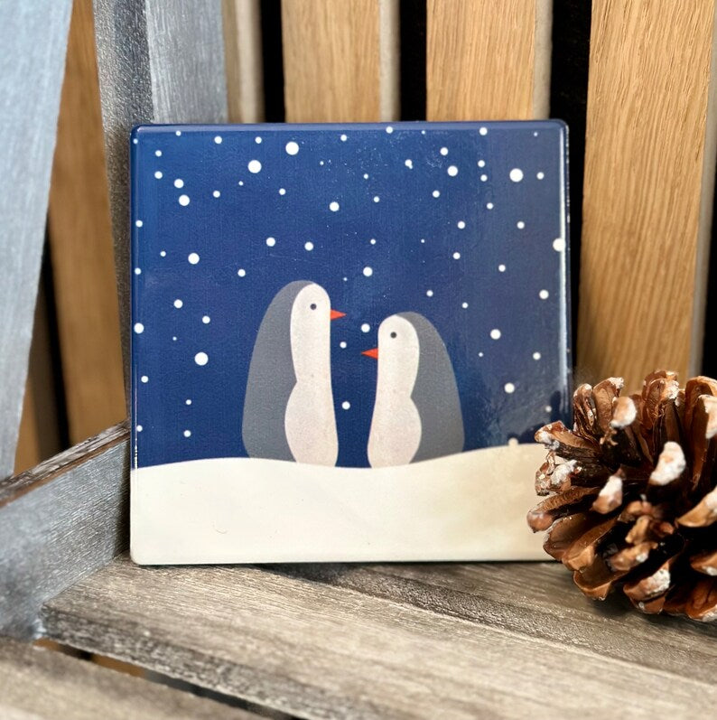 Set of four Christmas penguin coasters by Sable Homeware featuring festive penguin designs on durable drink coasters.