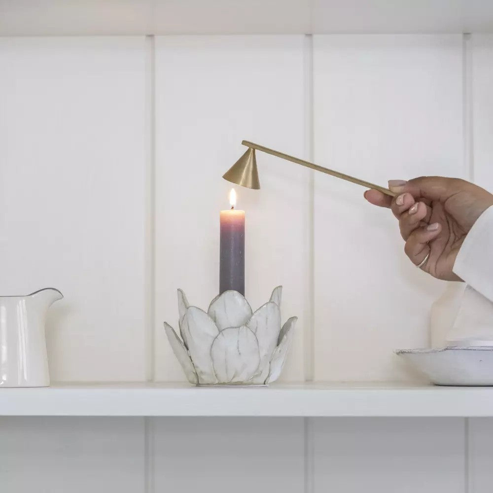 White petal-shaped candle holder by Sable Homeware with delicate floral design, perfect for elegant home decor.