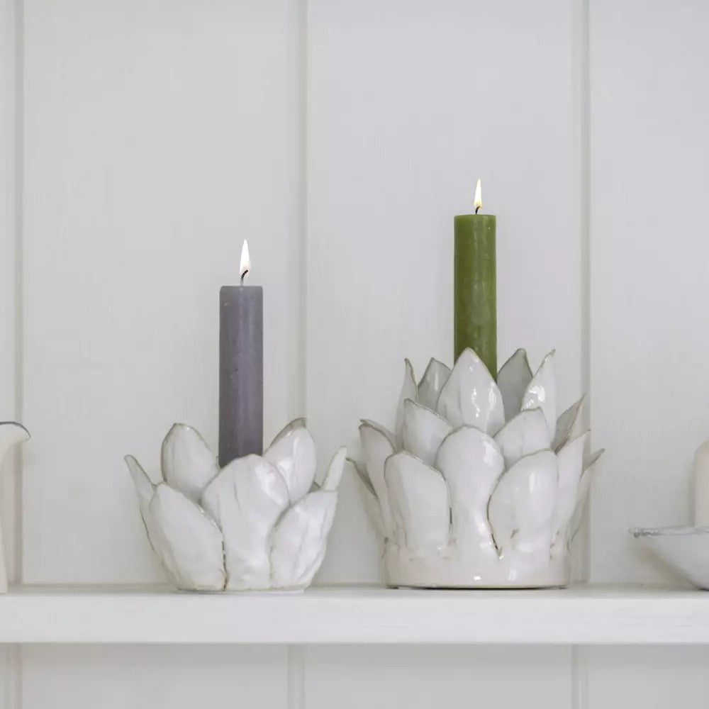 White petal-shaped candle holder from Sable Homeware, elegant ceramic design for decorative or functional use.