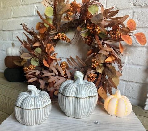 Set of two natural glazed ceramic pumpkin pots for Halloween decoration by Shabbyquins, featuring orange and green pumpkin designs.