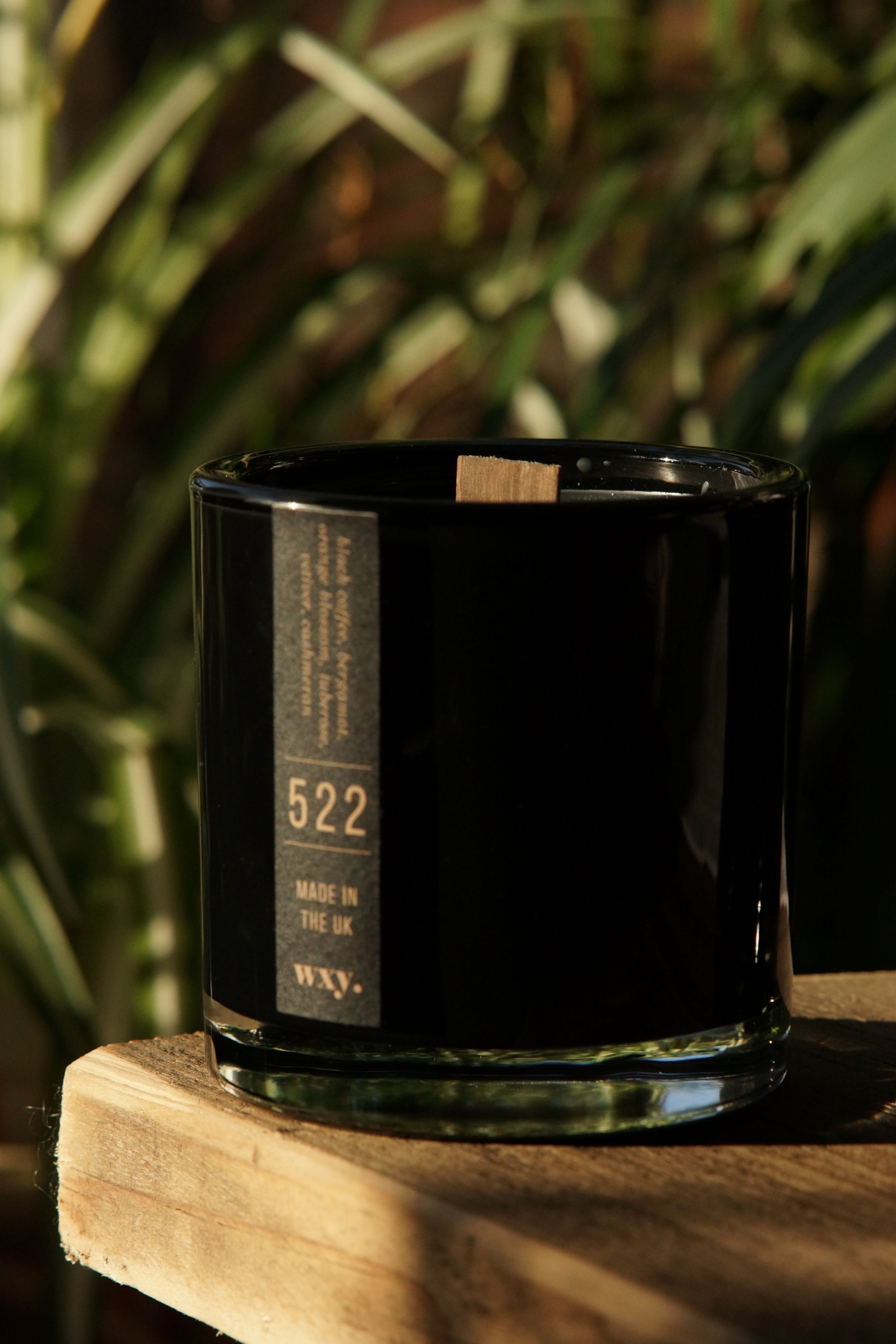Sable Homeware Wxy Luxury Umbra Candle and Room Spray in a stylish candle holder with elegant design and decorative accents