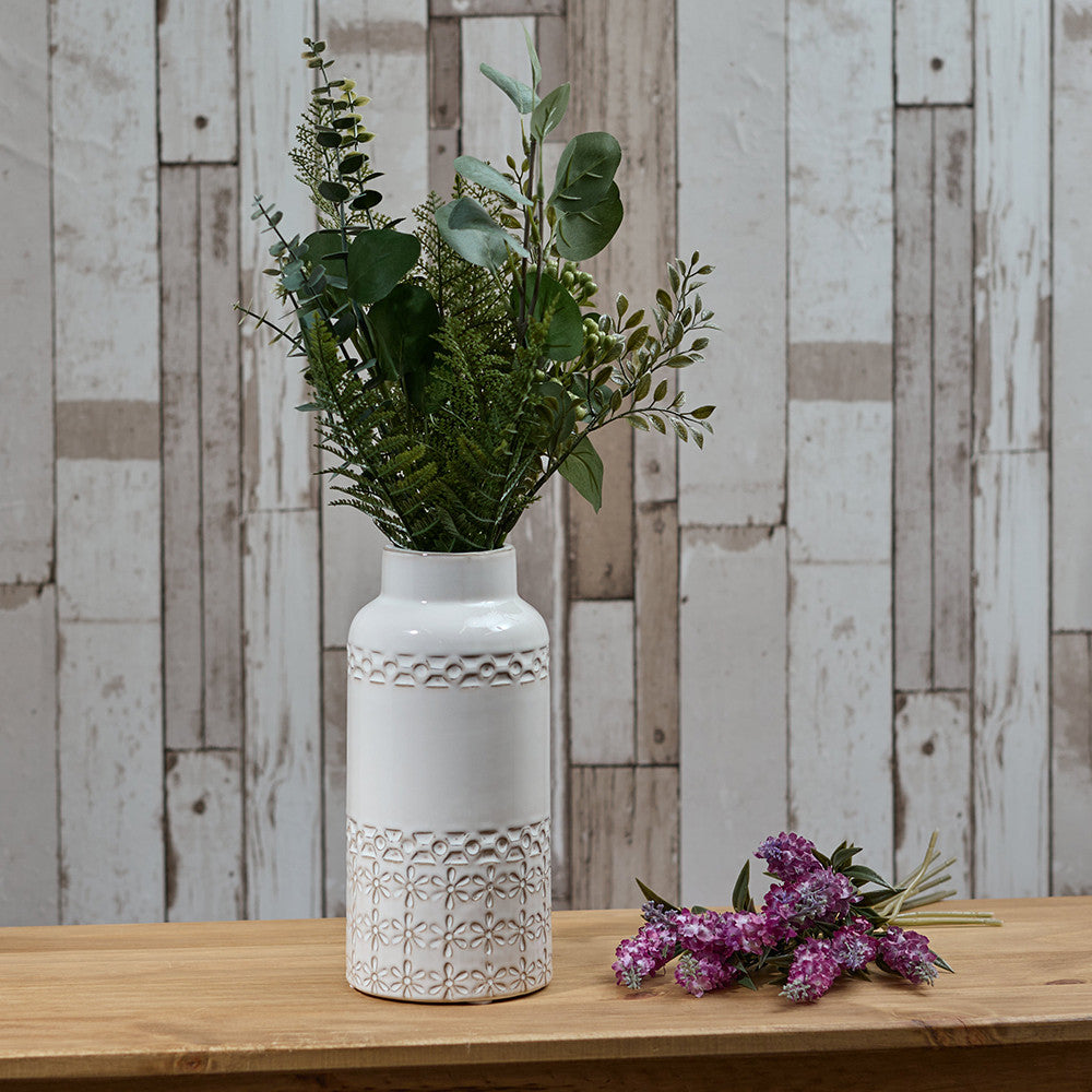 Petal embossed white ceramic vase by Sable Homeware, showcasing a delicate floral pattern and elegant design.