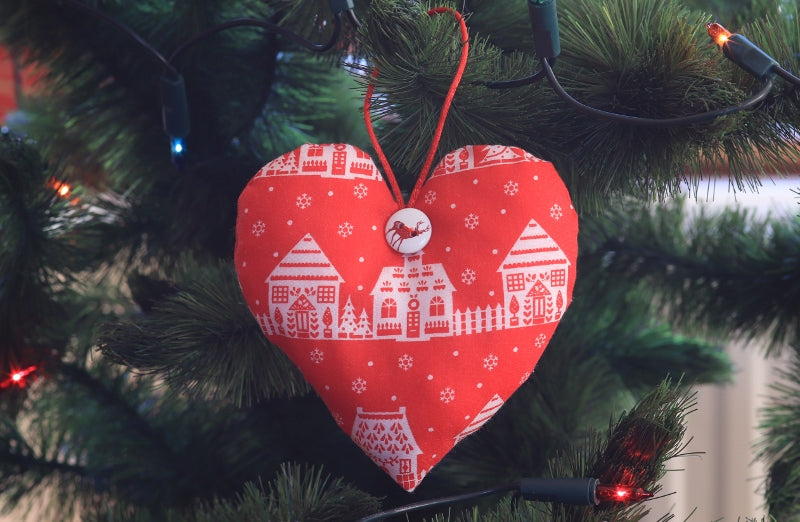 Handmade Christmas tree ornaments by Sable Homeware featuring festive designs for holiday decorating.