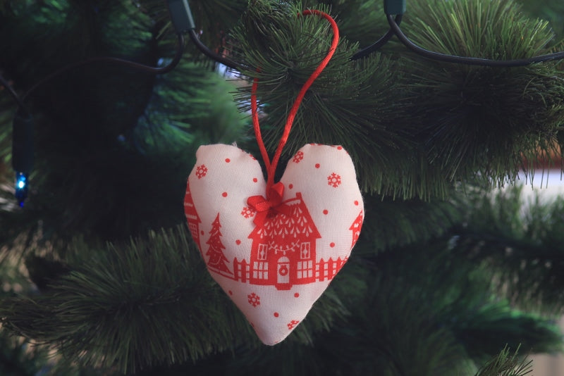 Handmade Christmas tree ornaments from Sable Homeware, colorful and festive decorations for holiday trees.