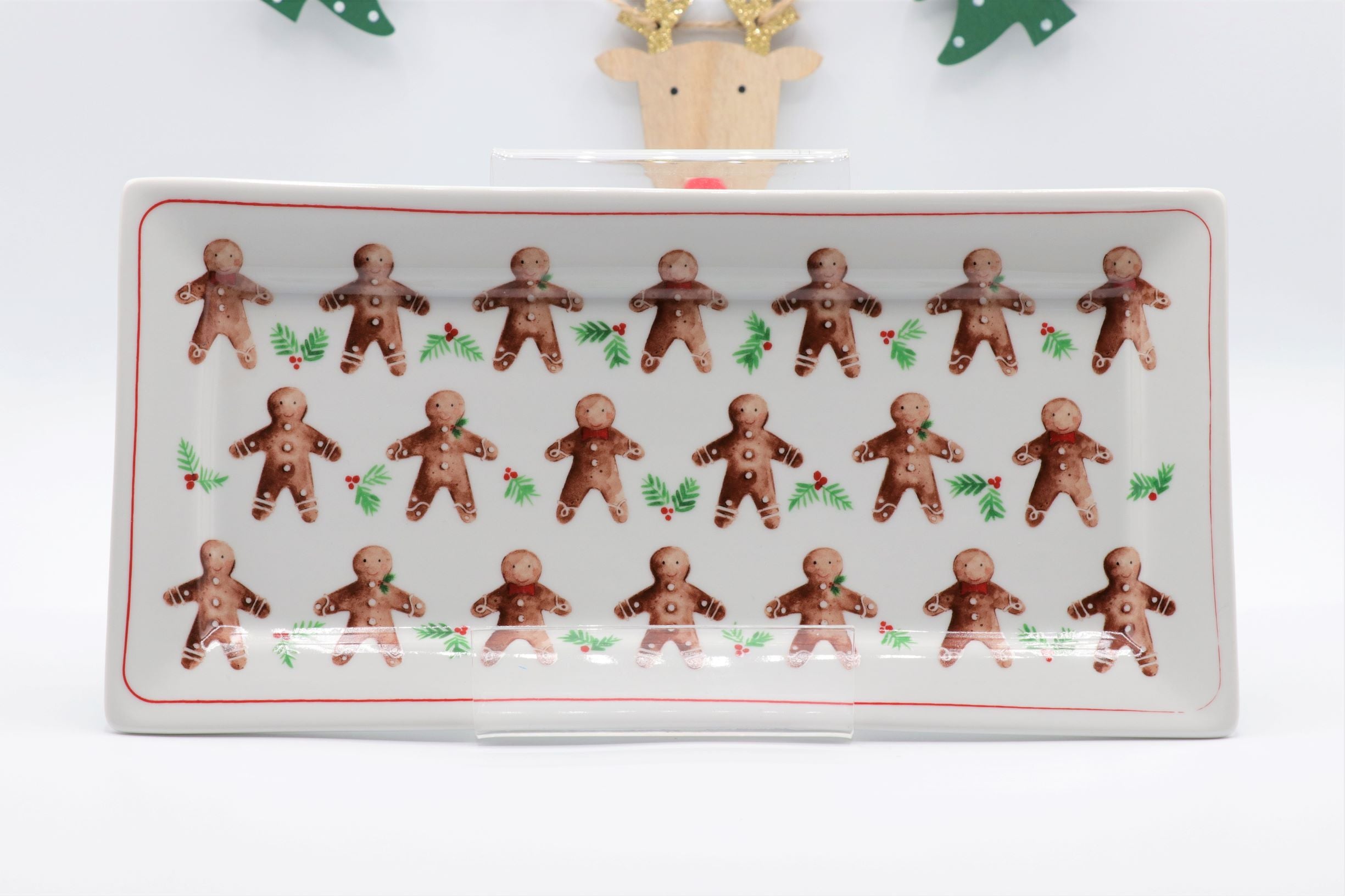 Bone china oblong plate by Sable Homeware featuring gingerbread men and plum pudding design, perfect for festive holiday servings.
