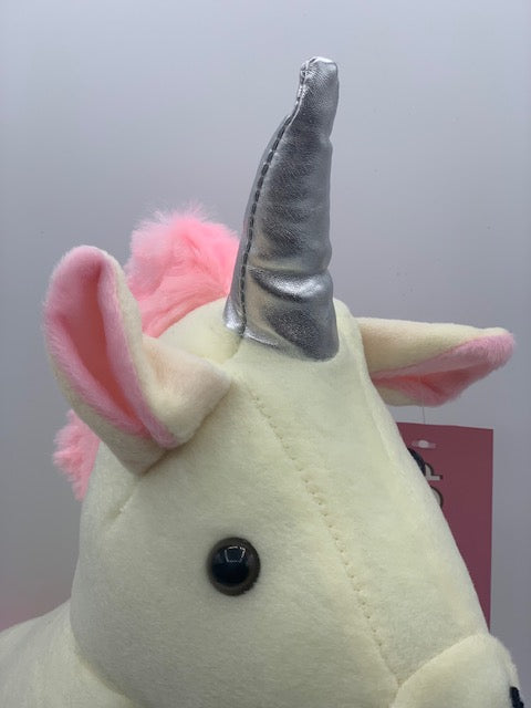 Shabbyquins unicorn door stop in white with colorful horn and hooves, shaped like a whimsical unicorn figure for holding doors open.