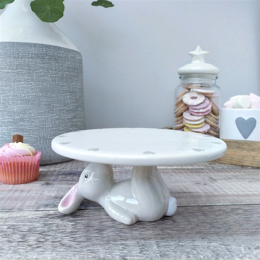 Shabbyquins bunny display stand decorative ornament in two styles, featuring charming bunny figures for home decor or display.