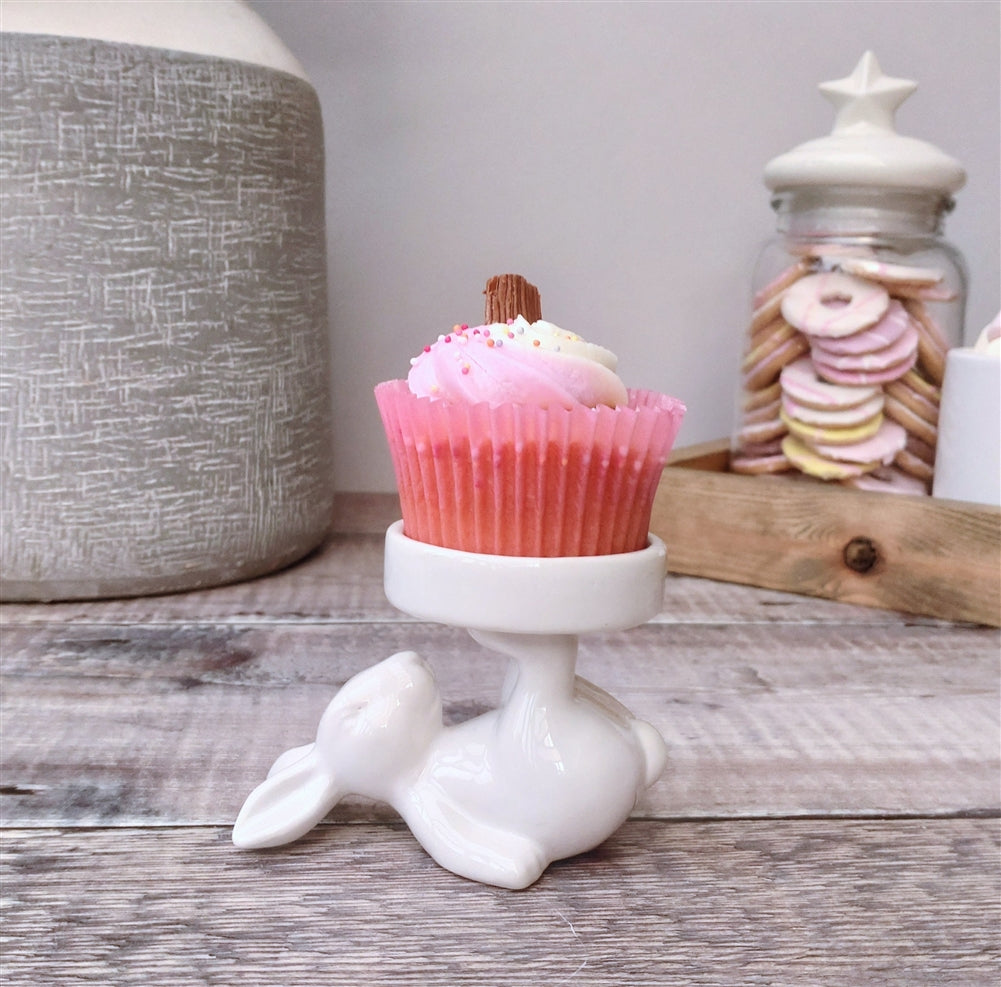 Decorative bunny figure on display stand by Sable Homeware, showcasing a charming bunny ornament for home decor.
