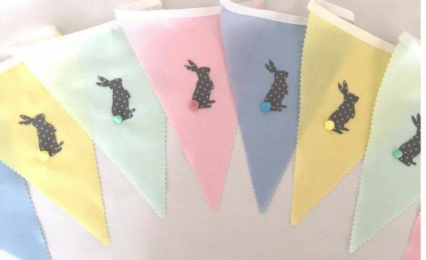 Colorful fabric Easter Bunny bunting by Sable Homeware, featuring two styles of charming bunny-shaped decorations.