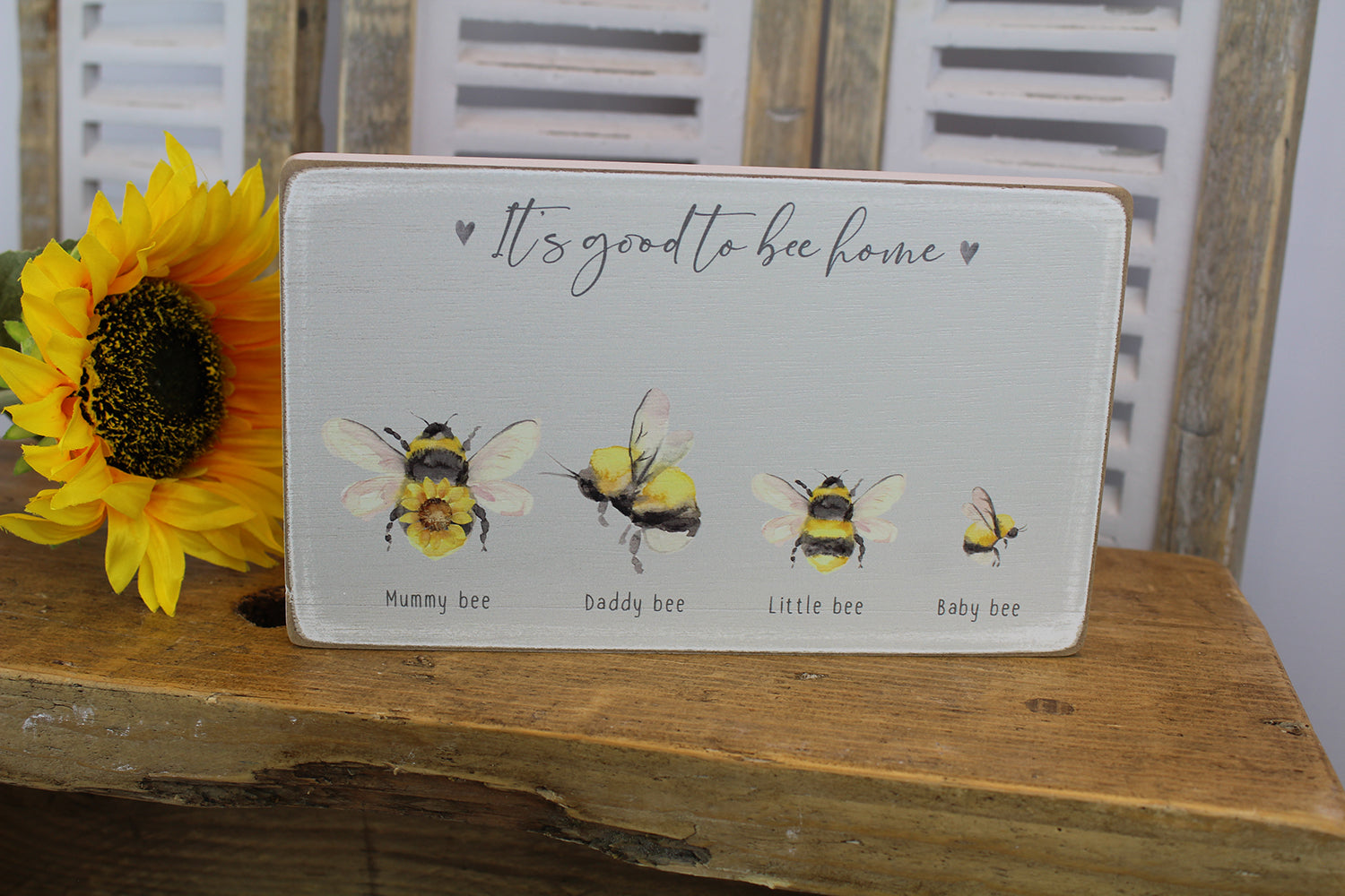 Sunflower and bee family block by Sable Homeware, featuring a decorative wooden family of four with sunflower and bee motifs.